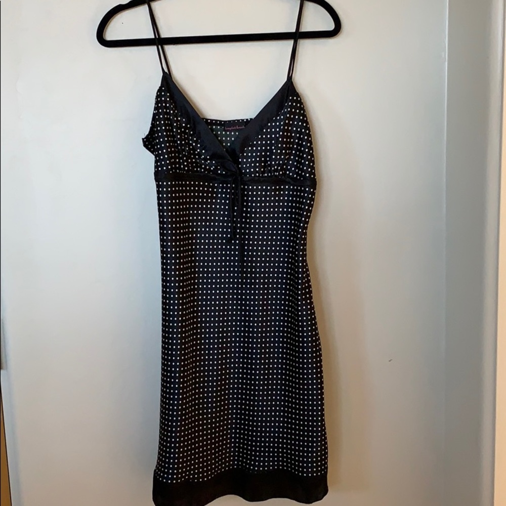Black dress with white polka dots